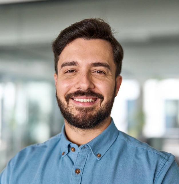 A happy man representing healthy and strong teeth