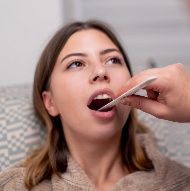 Dentist performing an oral surgery procedure