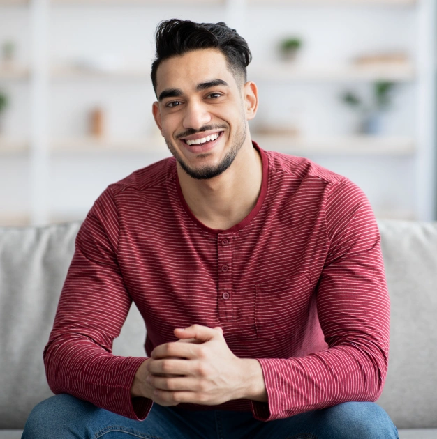 A happy man representing healthy and strong teeth